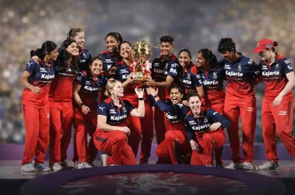 Royal Challengers Bangalore Women celebrate their historic WPL title win with the trophy