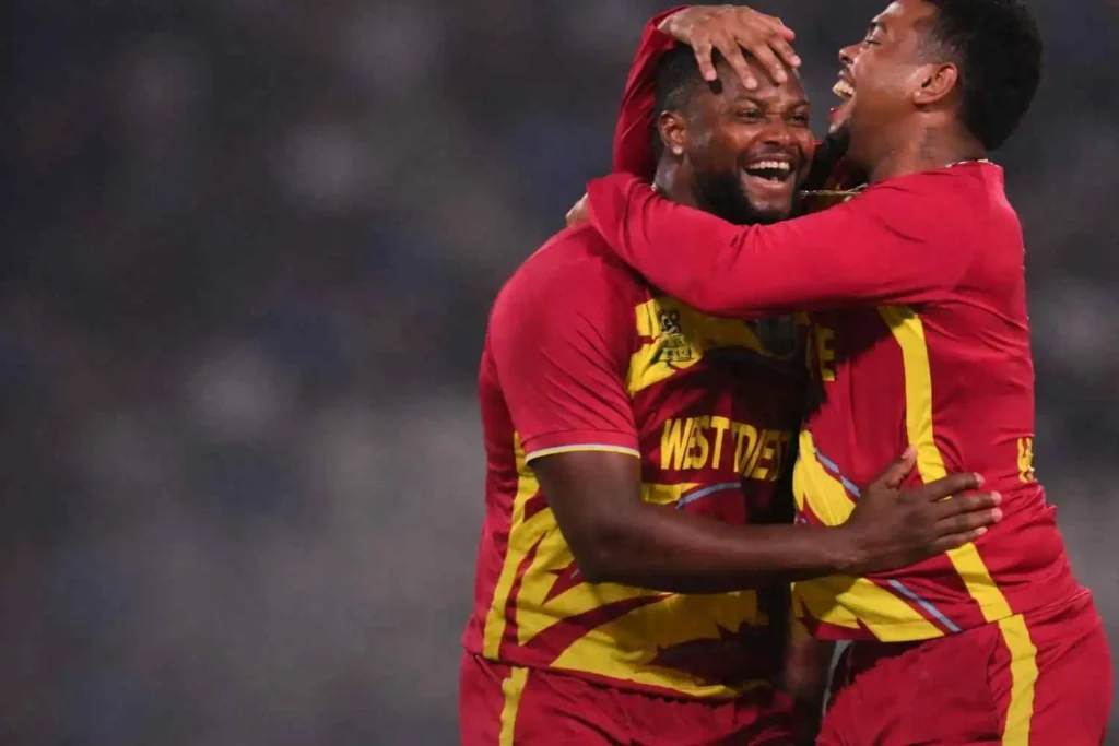 West Indies players celebrate a wicket during T20 World Cup match against Scotland
